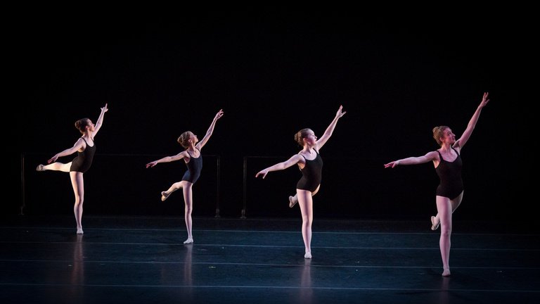 4 female dancers on a stage