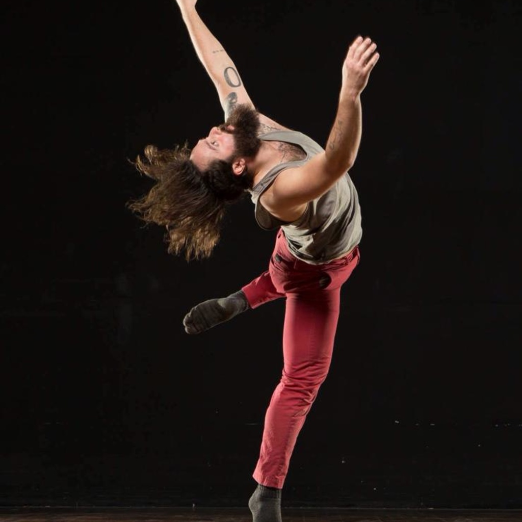 Mikey Roux reaching into air